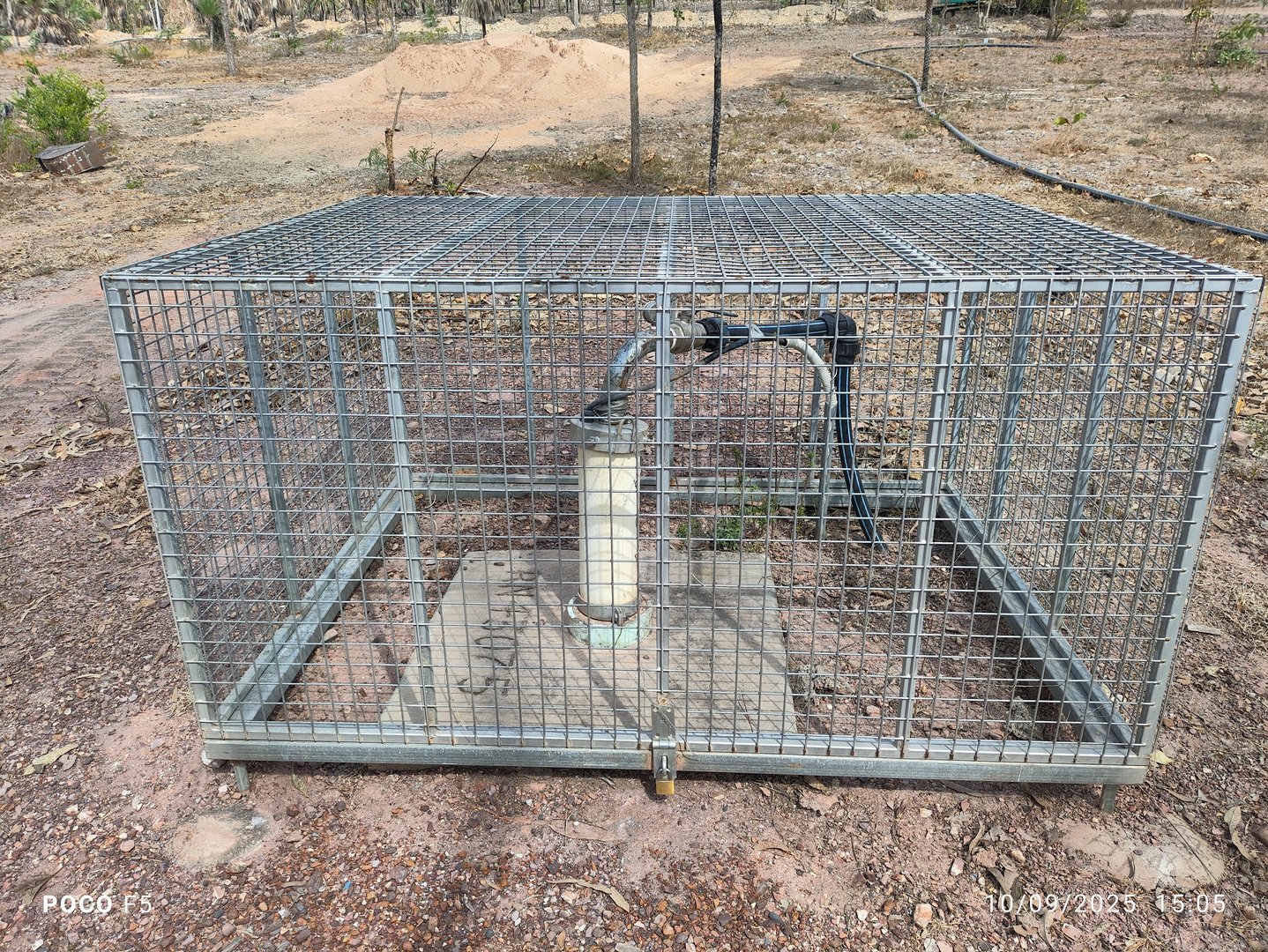 Bore 1 setup — RN43075 in wire-mesh cage