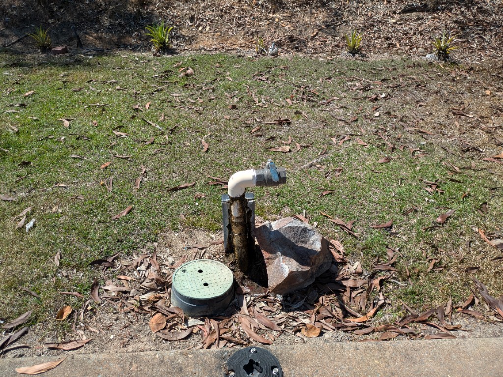 Flush-out valve at the end of the east-side main near unit #58