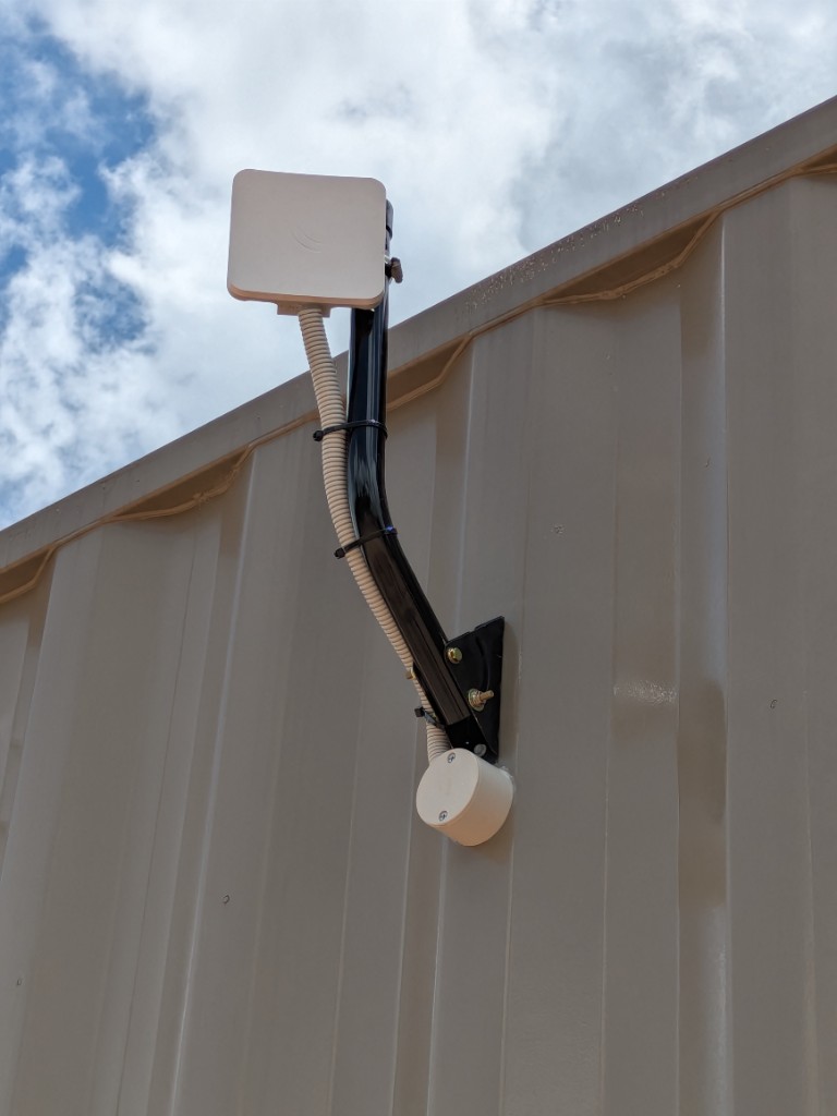 MikroTik WiFi transmitter on the mast outside the WWTP control room